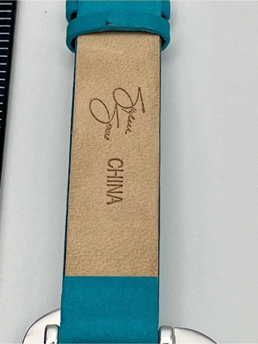 Suzanne Somers Turquoise Flower Watch with Rhinestone Bezel. Blue Leather Band